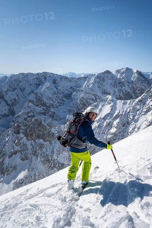 Ski tourers on the descent from the Alpspitz east slope