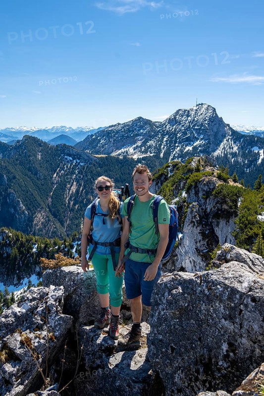 Two hikers on the summit of Breitenstein