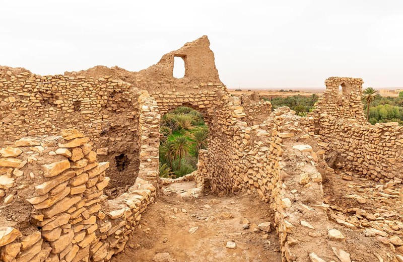 Ruins of the ancient city at the oasis Source Bleu