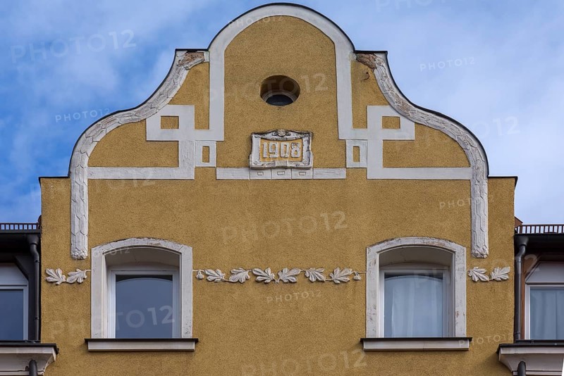 Art Nouveau relief on the gable of a residential house