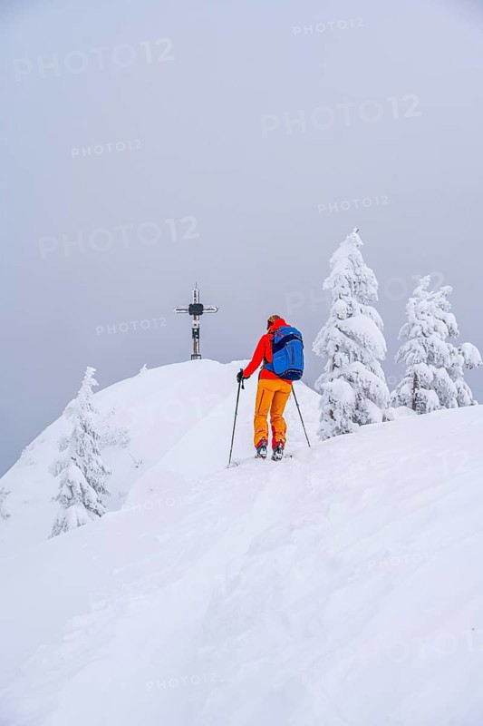 Young woman on ski tour