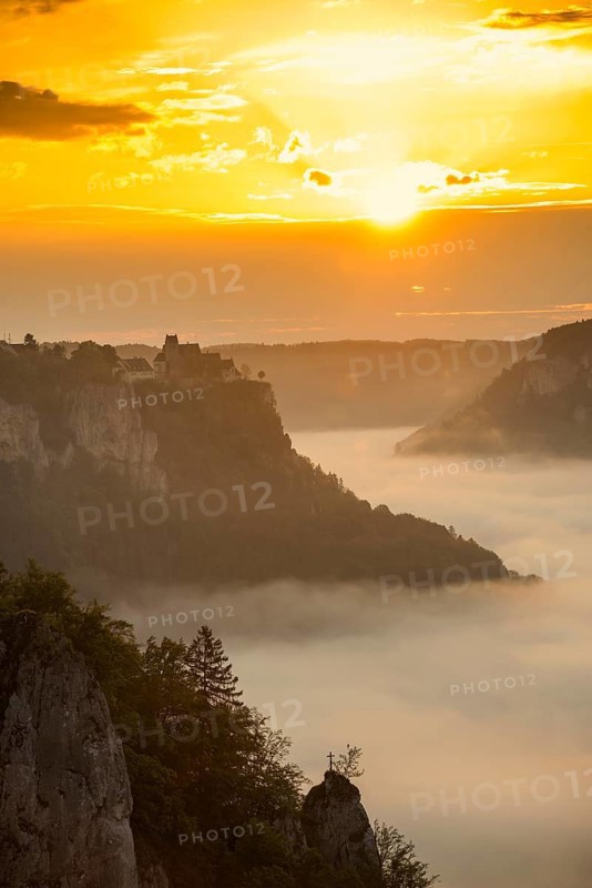 View from Eichfelsen to Werenwag Castle with morning fog