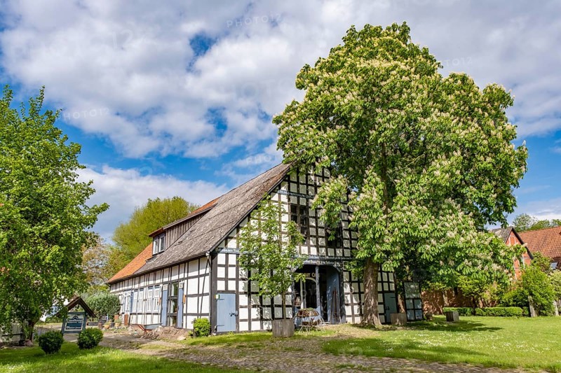 Half-timbered house in the round village Satemin