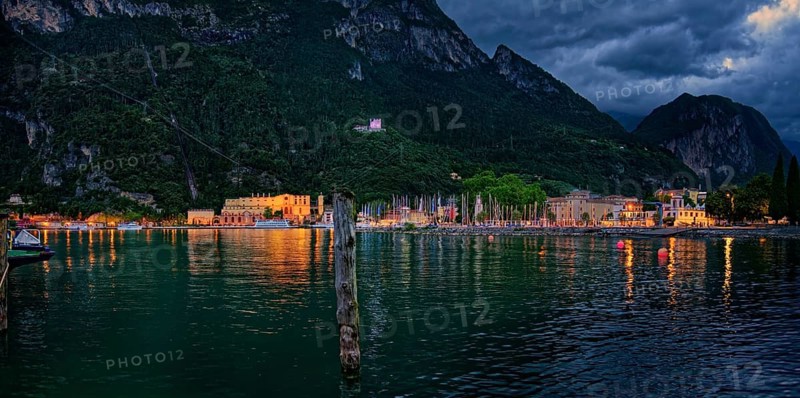 Colorfully lit harbor in the evening