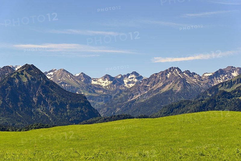 View from the meadows near the village Reichenbach to the mountain panorama of the Allgaeu Alps