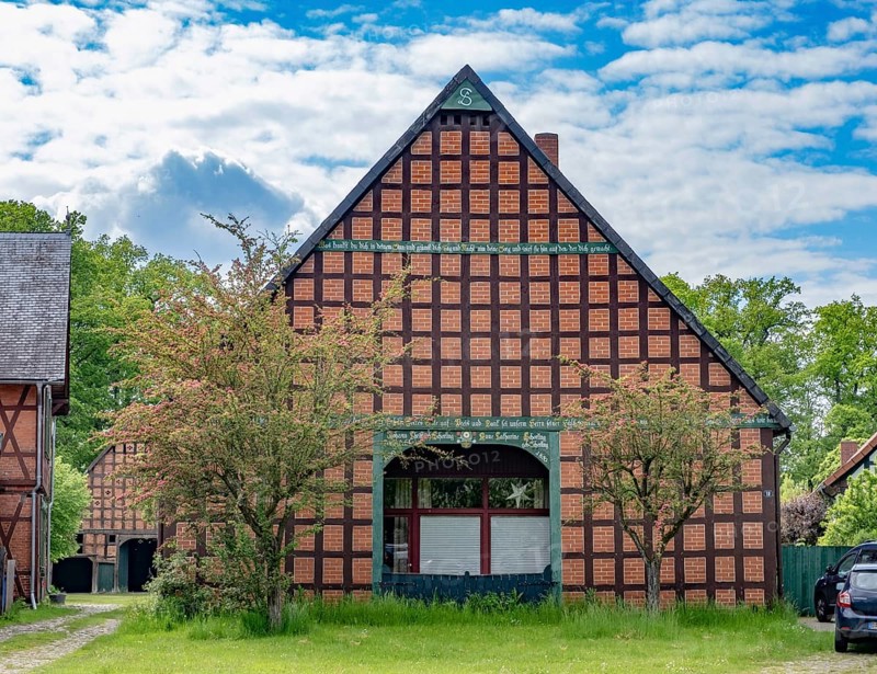 Half-timbered house in the round village of Satemin