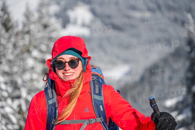 Young woman on ski tour