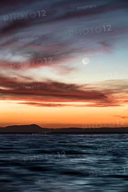 Moon at sunset at Lake Taupo