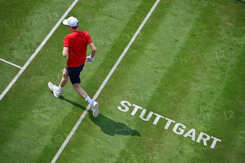 Ball boy on grass court