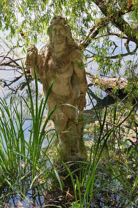 Sculpture of Hercules by Erwin Franz Wiegerling with weeping willow