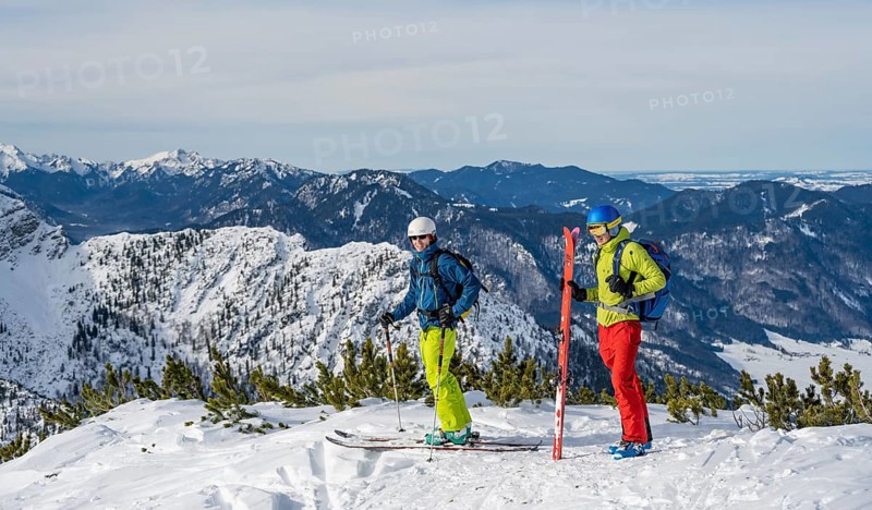 Two ski tourers at the summit of Simetsberg