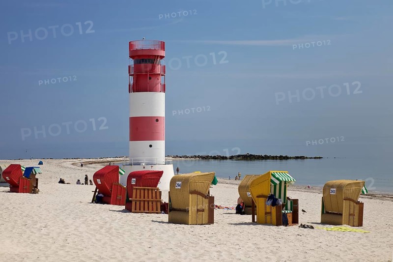 Lighthouse with beach chairs at the south beach of the island Duene
