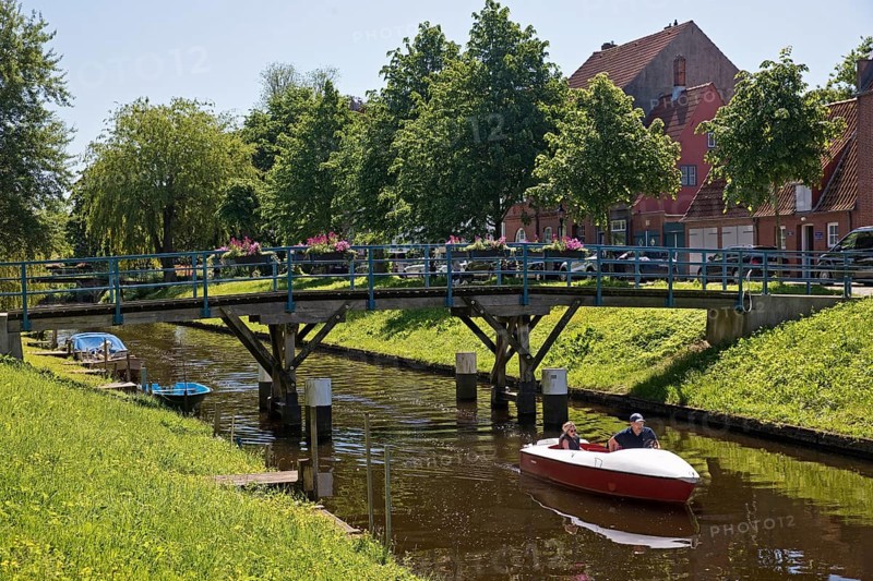 Bridge over the central canal Mittelburggraben with pedal boat