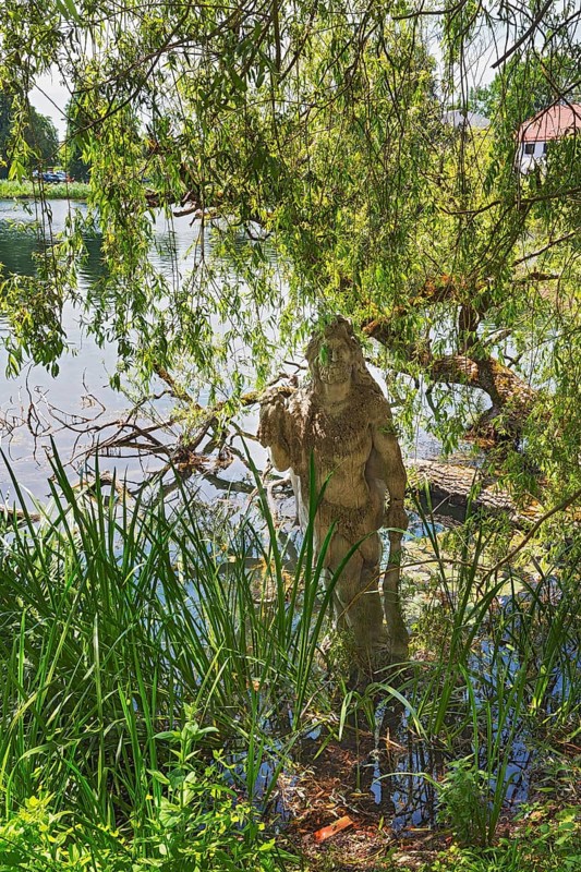 Sculpture of Hercules by Erwin Franz Wiegerling with weeping willow