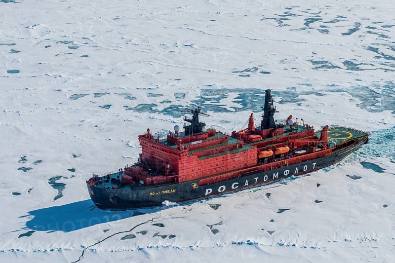 Aerial of the Icebreaker '50 years of victory' on its way to the North Pole breaking through the ice