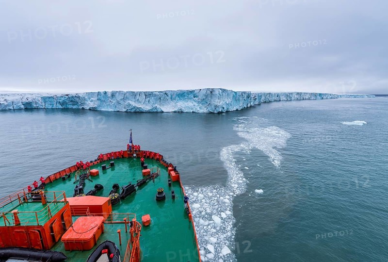 Icebreaker apporaching a massive glacier on Mc Clintok or Klintok Island