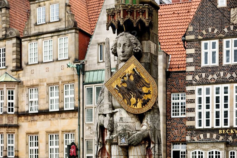 Bremen Roland in front of historic gabled houses