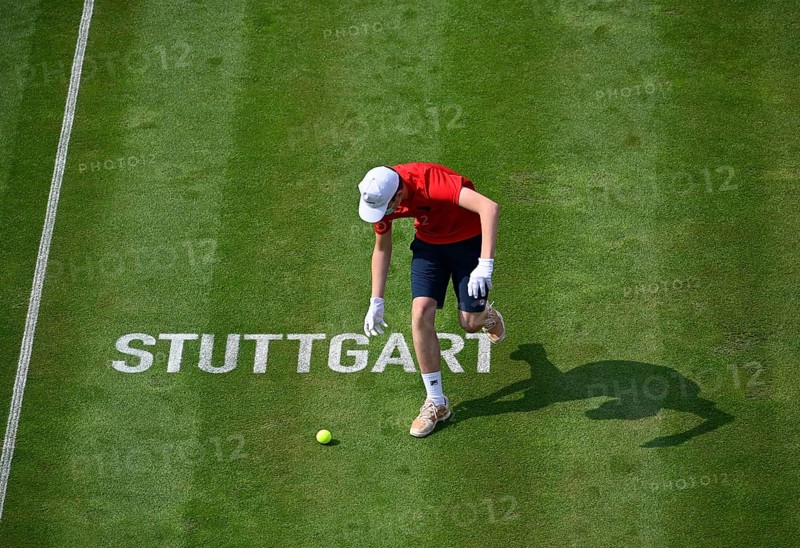Ball boy on grass court