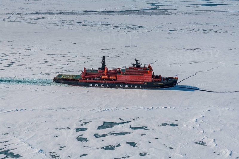 Aerial of the Icebreaker '50 years of victory' on its way to the North Pole breaking through the ice