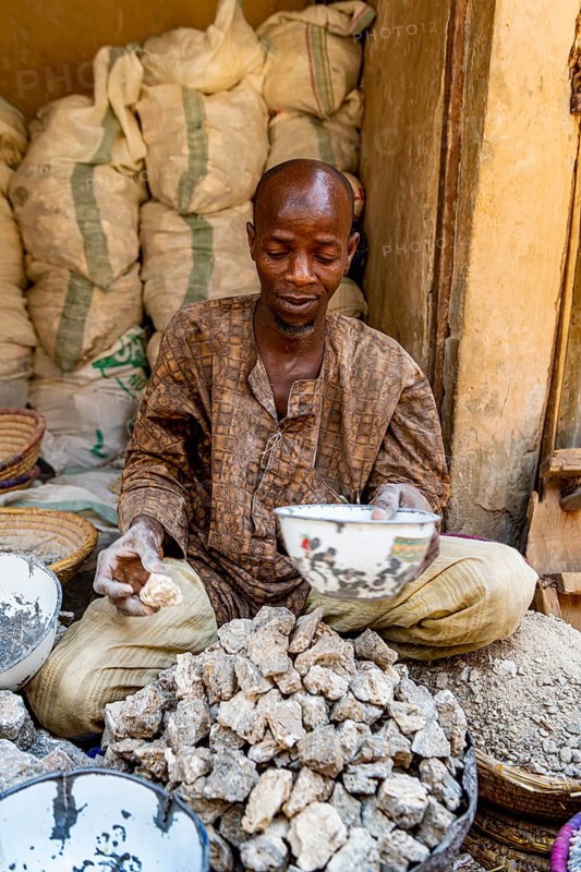 Man selling soapstones