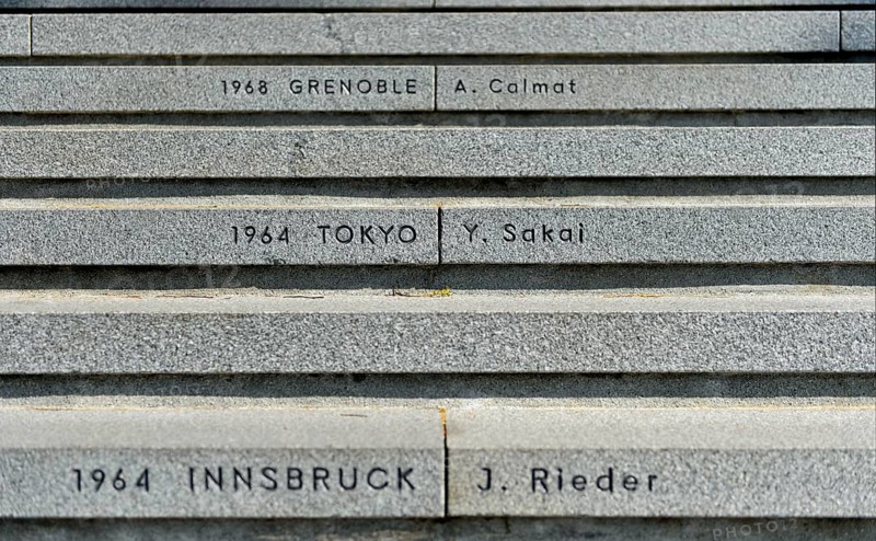 Stairs to the Olympic Museum with the venues of the Olympic Games and the names of the last torchbearer