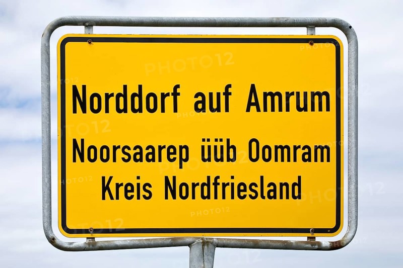 Bilingual place-name sign of Norddorf on the island Amrum in German and Frisian