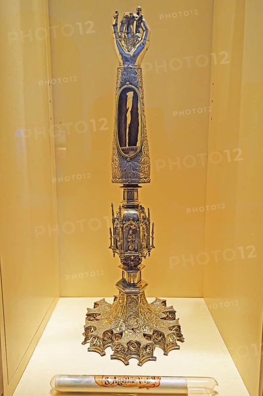 Golden monstrance with forearm bone as relic