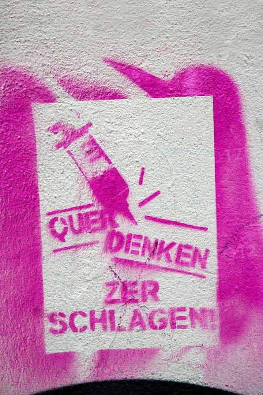 Pink stencil on a house wall