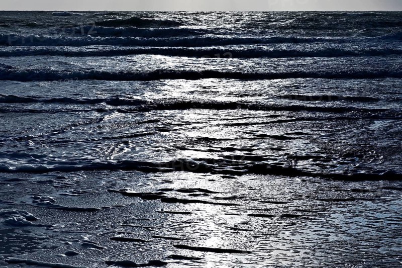 North Sea with outgoing waves in backlight