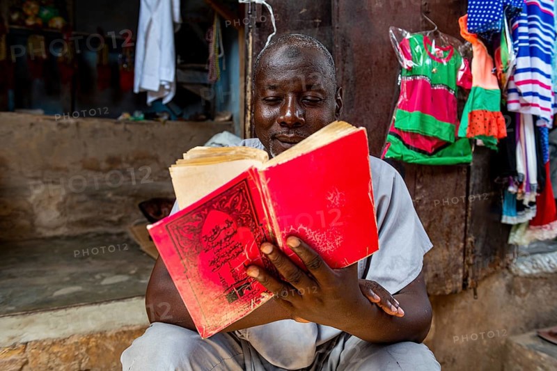 Man reading the Quoran