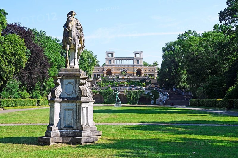 Equestrian statue of Frederick II and archer in front of the Orangery