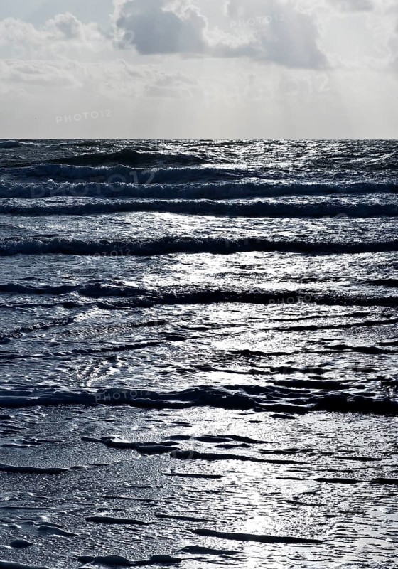 North Sea with outgoing waves in backlight