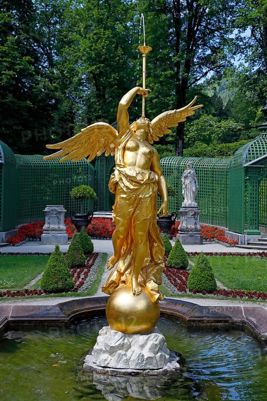 Golden fountain figure of the goddess of fate Fama