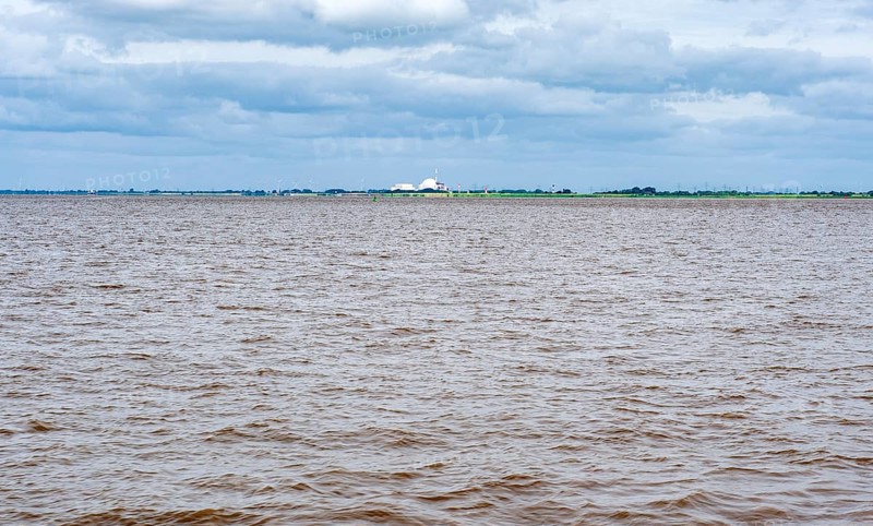 In the back Brokdorf nuclear power plant at the river Elbe