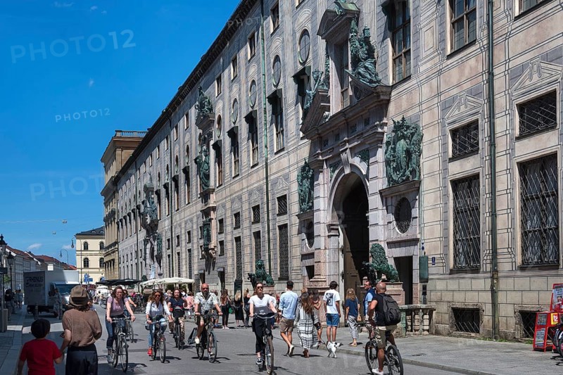 West front of the Residenz with Residenzstrasse and cyclists