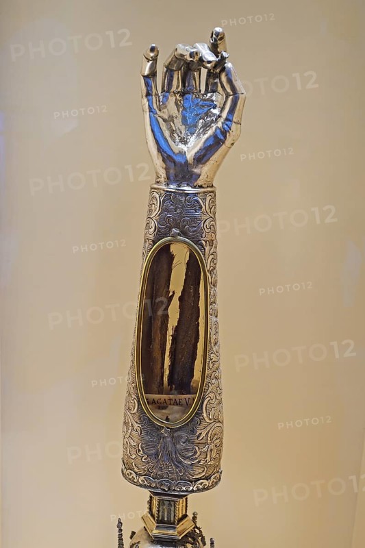 Golden monstrance with forearm bone as relic