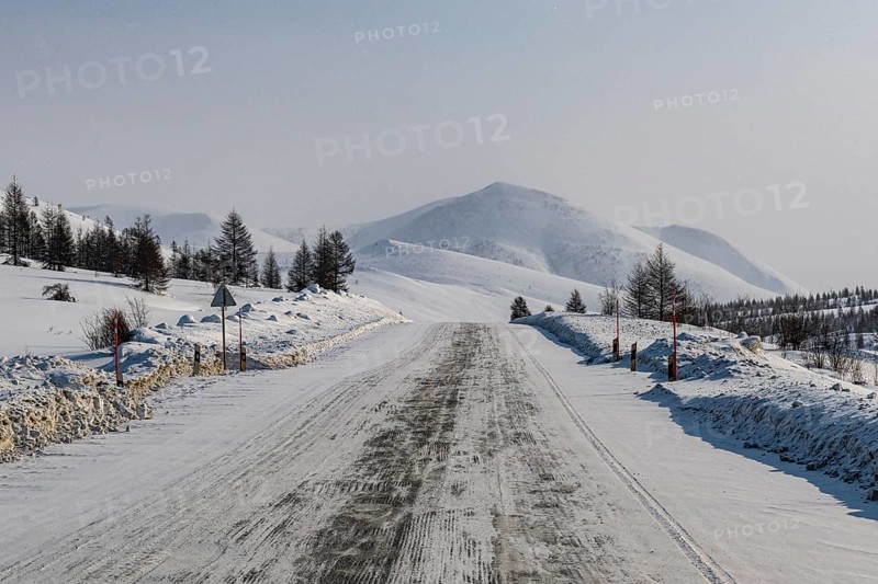 Snow covered mountains along the Road of Bones