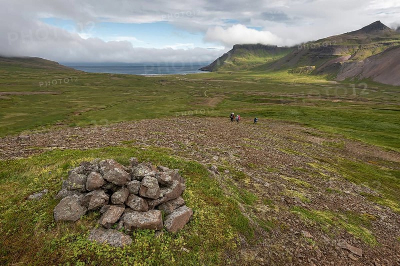 Hikers on their way to Breioavik Bay