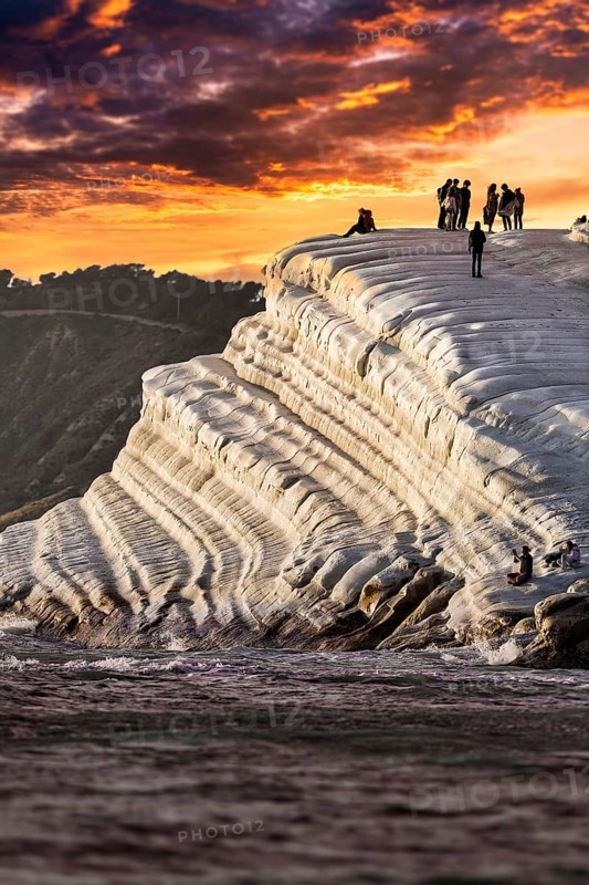 Sunset on rocky coast