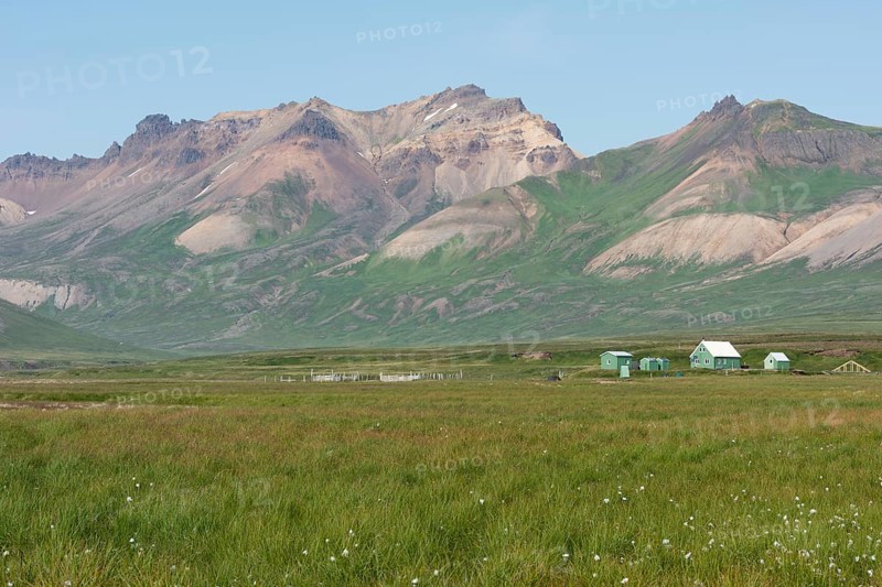 Cabins of the Icelandic Hiking Association and coloured rhyolite mountains
