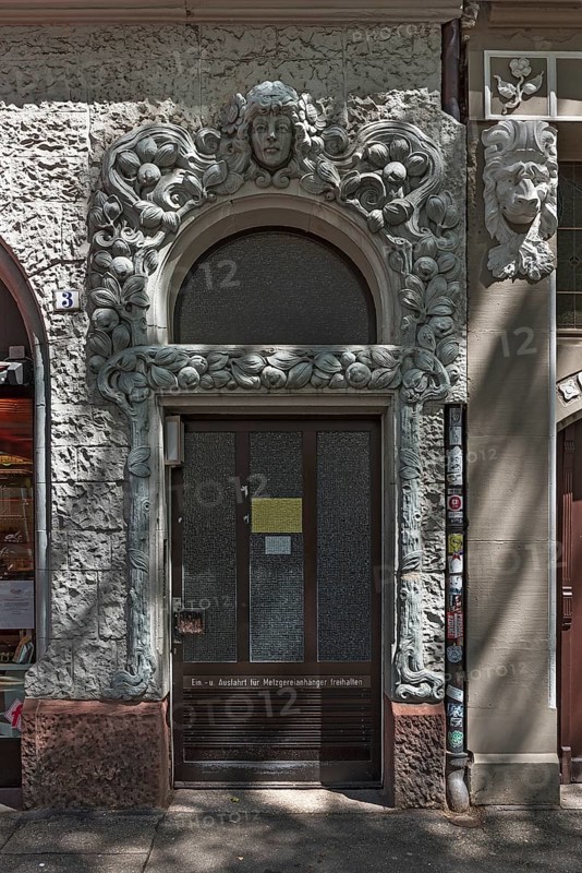 Art Nouveau entrance with decorative reliefs