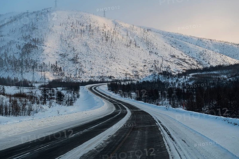 Snow covered mountains along the Road of Bones