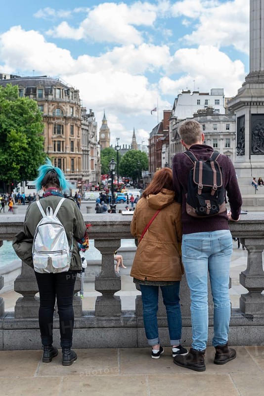 Young people standing in Trafalgar Square