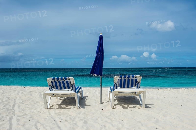 Sun loungers on world class Shoal Bay East beach