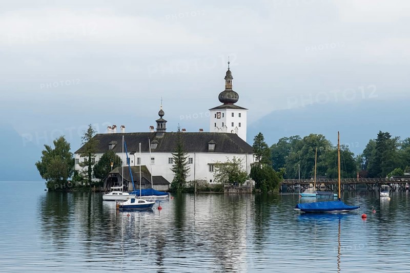 Orth Castle on Lake Traun in Gmunden with boats