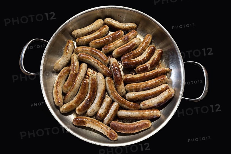 Nuremberg sausages in a frying pan