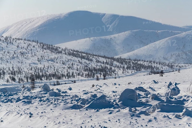 Snow covered mountains along the Road of Bones
