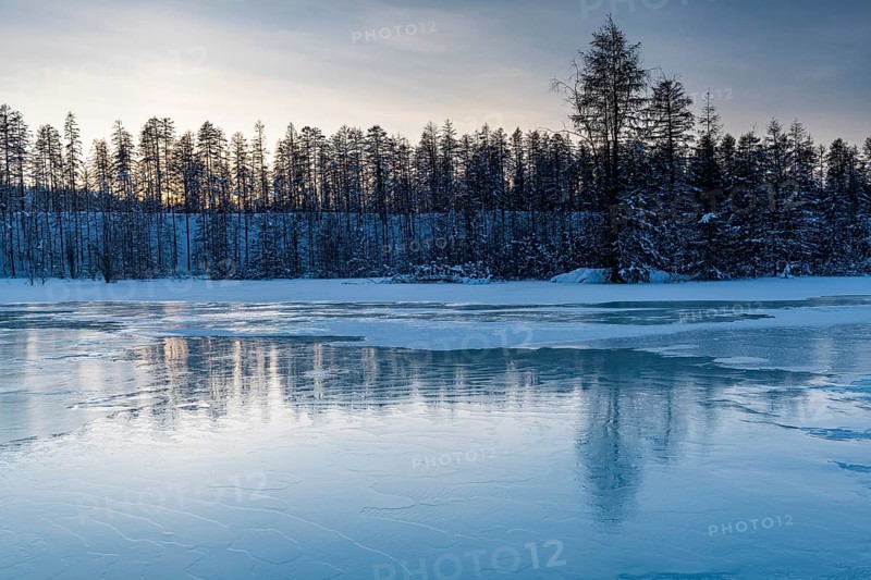 Open water on a frozen lake