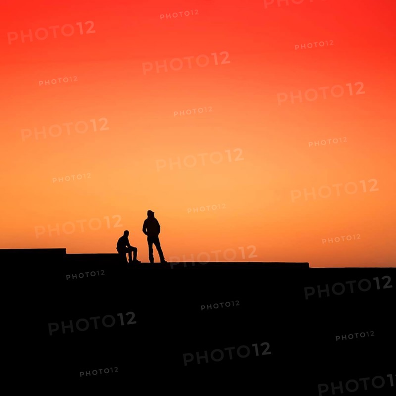Two men looking into the distance