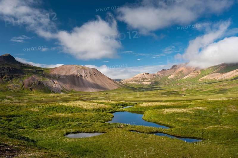 Lake and coloured rhyolite mountains